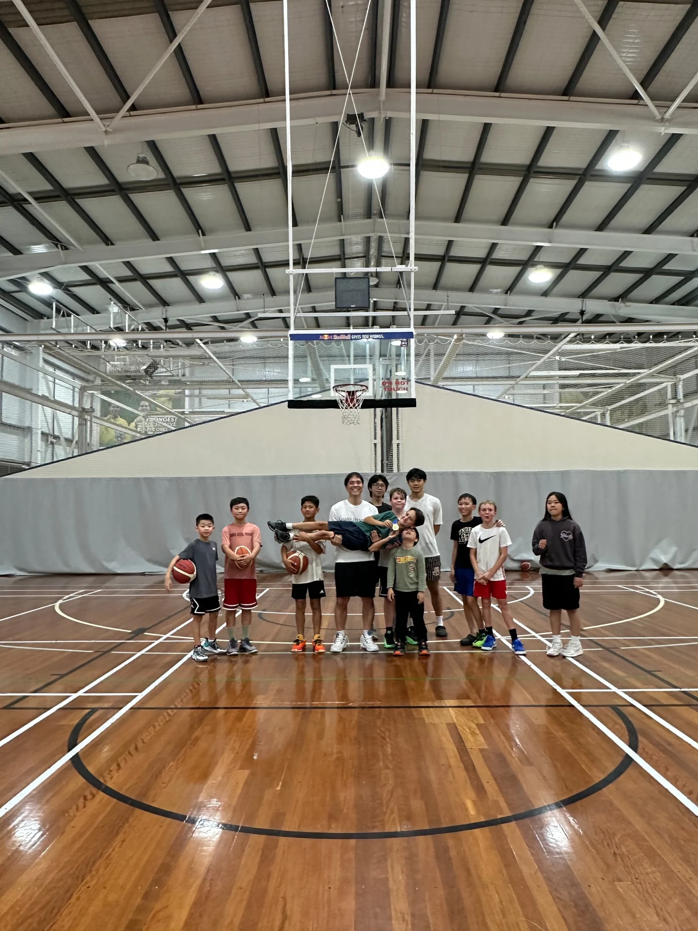 SHIN FITNESS players training together on an indoor basketball court on the Gold Coast